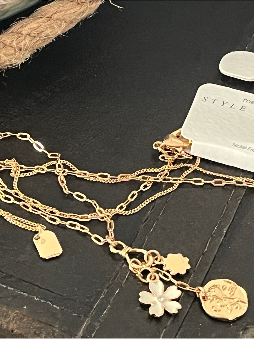 Maurices Gold Layered Charm Necklace with Floral and Coin Pendants